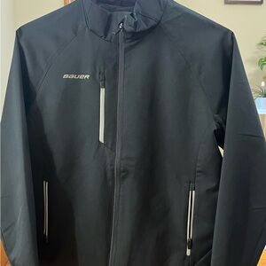 Brand new Bauer light weight hockey jacket. Youth size large in the color black.